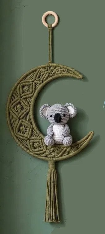 Finished crescent moon koala macramé pattern wall hanging with diamond lattice