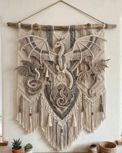 Finished dragon wall hanging macramé pattern featuring four dragons with spread wings and layered fringe