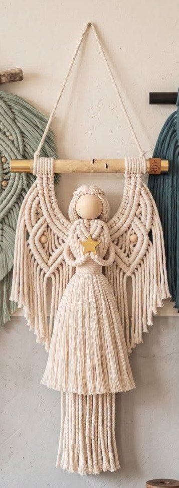 Completed ivory angel wall hanging macramé pattern with lattice wings and star charm
