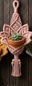 Finished lotus planter macramé pattern with layered petals and terracotta pot