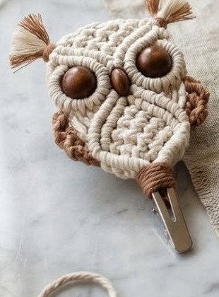 Finished boho owl macramé pattern hair clip in natural cotton with wooden bead eyes