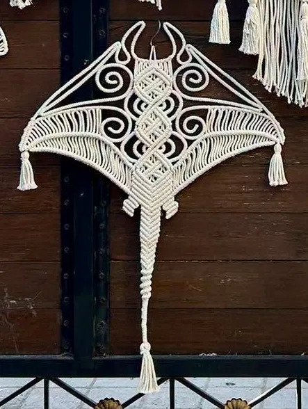 finished manta stingray macramé pattern wall hanging with swept wings and knotted tail